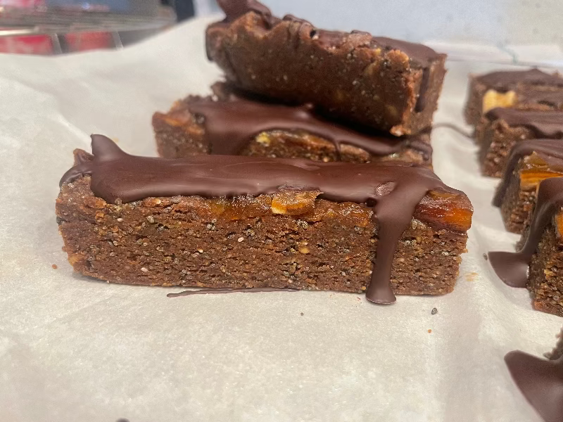 peanut butter protein bar covered in dark chocolate